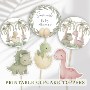 May include: A collection of printable cupcake toppers with a baby shower theme. The toppers feature watercolor illustrations of dinosaurs, palm trees, and the text "Samuel Baby Shower". The color palette includes green, pink, and beige.