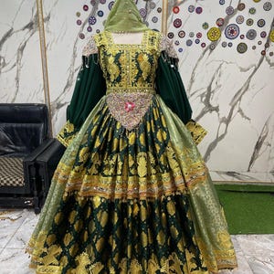 modern balochi bridal dresses Red bridal balochi hand work, wedding dress Rs 65,000 PKR*