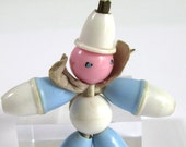 Vintage Baby Rattle Celluloid little boy with painted face with white cap blue white celluloid body 1950 39 s