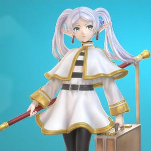 May include: A detailed figurine of a female anime character with long, light purple hair in pigtails. She wears a white dress with gold trim, a black belt, and black leggings. She holds a staff with a red gem and gold accents. The background is a solid teal color.