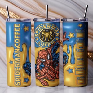 May include: Three stainless steel travel mugs with lids and straws. The mugs have a yellow and blue design with the words "SPIDERMAN COFFEE" and a Spider-Man graphic. One mug has a drink customization chart.