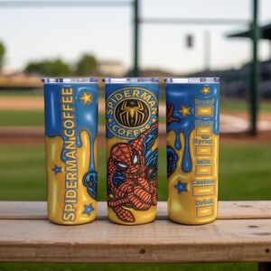 May include: Three stainless steel tumblers with a Spider-Man theme. The tumblers are yellow and blue with the words "Spider-Man Coffee" and a Spider-Man graphic. One tumbler has a coffee order form.