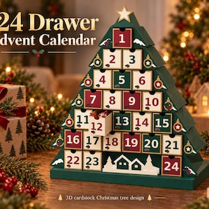May include: A 24-drawer advent calendar shaped like a Christmas tree, constructed from green cardstock. The drawers are numbered 1 through 24 in red or green text on white backgrounds, featuring small holly illustrations and a gold star topper.
