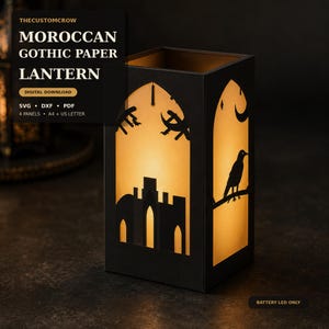 May include: A rectangular paper lantern with black cut-out panels featuring a gothic arch, a castle silhouette, a crescent moon, and a crow. The lantern glows with a warm light from within. Text on the image reads THECUSTOMCROW MOROCCAN GOTHIC PAPER LANTERN DIGITAL DOWNLOAD SVG DXF PDF 4 PANELS A4 + US LETTER BATTERY LED ONLY.