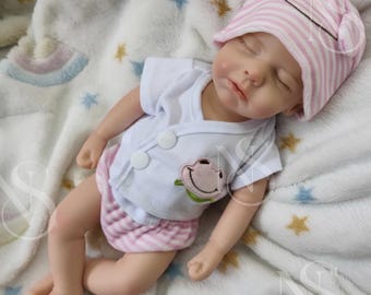 Handmade 13 inch full body soft silicone reborn doll with 3D painted skin. Soft, collectible art doll for gifts.