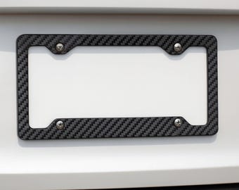 Carbon Fiber Look Metal License Plate Frame, Ultra Durable Slim Car Tag Holder, Black Gloss Finish, Universal Fit Front & Rear