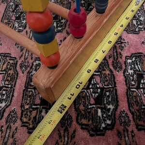 May include: A set of three ceramic mugs with a speckled, matte finish. The mugs are in shades of cream, light gray, and dark gray. Each mug has a simple, minimalist design, perfect for coffee or tea.