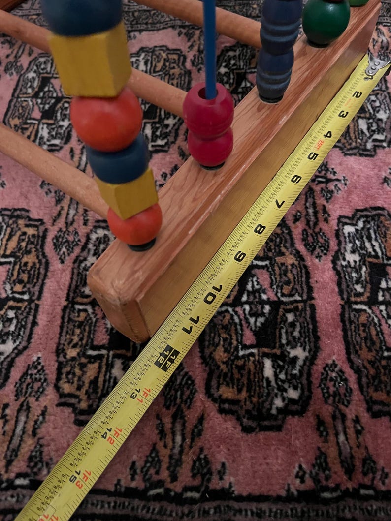 May include: A set of three ceramic mugs with a speckled, matte finish. The mugs are in shades of cream, light gray, and dark gray. Each mug has a simple, minimalist design, perfect for coffee or tea.