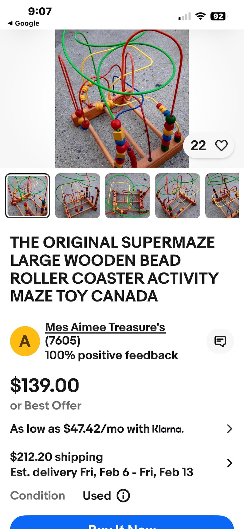May include: A wooden bead roller coaster activity maze toy with colorful beads and wire tracks. The toy features a wooden base and frame with red, green, yellow, and blue wires. The text "THE ORIGINAL SUPERMAZE" is visible.