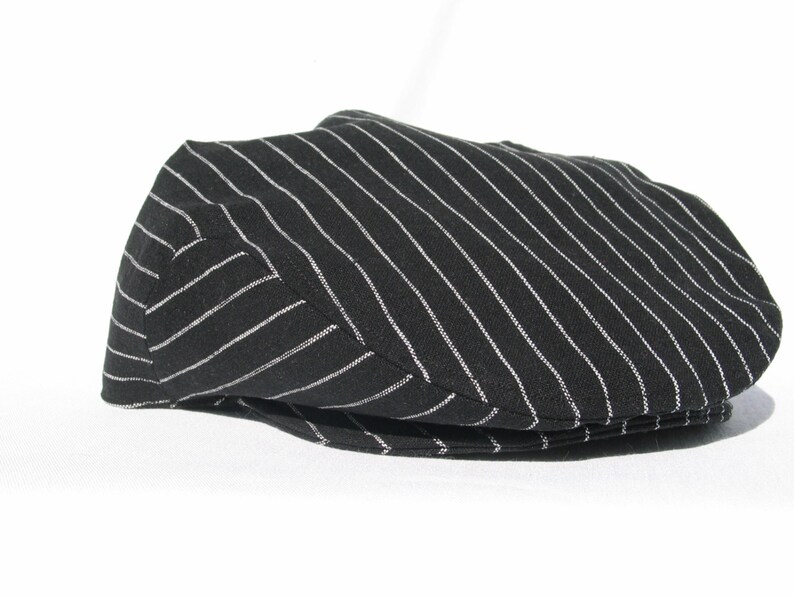 black and white newsboy cap