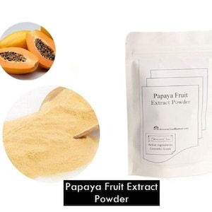 May include: An image features a white pouch labeled "Papaya Fruit Extract Powder" with a black rectangle at the bottom with the same text. Two papayas, one whole and one sliced, are shown. A circular image displays a pile of light-yellow powder.