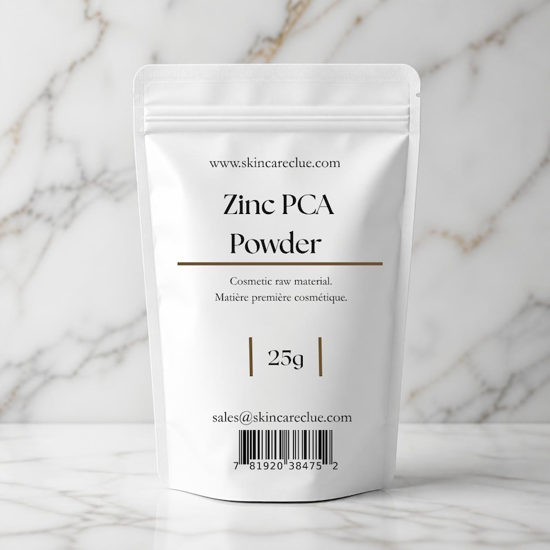 May include: A white stand-up pouch containing Zinc PCA Powder. The label displays the text www.skincareclue.com, Zinc PCA Powder, Cosmetic raw material, 25g, sales@skincareclue.com, and a barcode with the number 7 81920 38475 2.