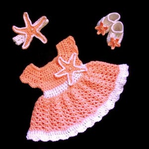 Perzik gehaakte babyjurk set pasgeboren babyjurk zeester babyoutfit babymeisjesjurk set gebreide babyjurk hoofdband koraal babymeisjesjurk