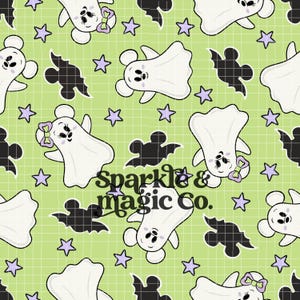 May include: A repeating pattern on a light green grid background featuring white cartoon ghosts with mouse ears, some wearing purple bows, interspersed with black bat silhouettes and small light purple stars. The text Sparkle & magic Co. is centered.