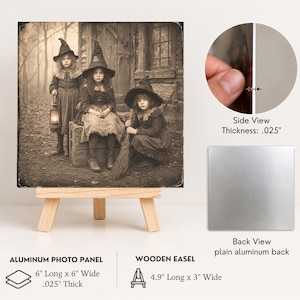 May include: A square aluminum photo panel featuring a sepia-toned image of three children in witch hats, displayed on a wooden easel. The panel measures 6 inches long by 6 inches wide with a .025 inch thickness. Includes a plain aluminum back view.