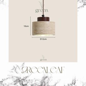 May include: A cylindrical pendant light with a beige stone-like shade, 4 inches tall and 4.7 inches in diameter, and a dark brown top. The light hangs from a brown cord. The word "green" is above the light.
