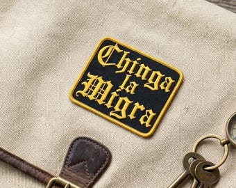 Chinga la Migra Iron On Patch - Gothic Lettering Social Justice Embroidered Badge - Anti-ICE Political Activist Patch