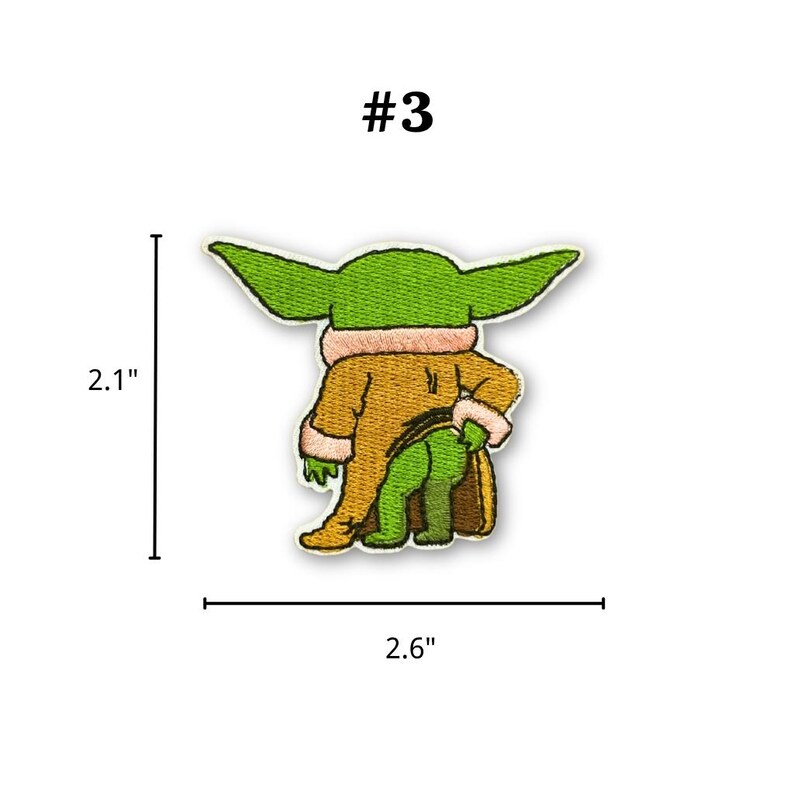 May include: Embroidered patch featuring a green character with large ears, wearing a tan coat. The patch is 2.1 inches tall and 2.6 inches wide, with the number "#3" at the top.