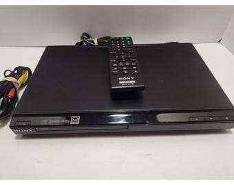 Sony DVP-SR210P dvd Player black with Remote RMT-D197A rca cables