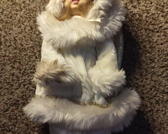 Vintage petite porcelain doll
