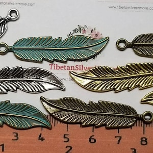 8 pcs per pack 43x10mm Feather Charm in color to choose Lead Free Pewter