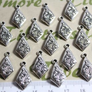 20 pcs per pack 18x12mm Mayan Glyph Charm Antique Silver Finish Lead Free Pewter