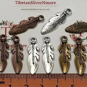 20 pcs per pack 25x7mm Feather Charm in color to choose Finish Lead Free Pewter