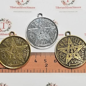 May include: Three silver, gold, and bronze pentagram charms with a five-pointed star and inscription. The charms are approximately 1.5 inches in diameter and have a loop for hanging.