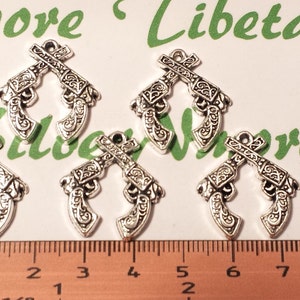 12 pcs per pack 23x22mm Crossed Gun Charms Antique Silver Lead free Pewter. image 1