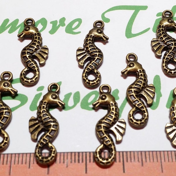 12 pièces par paquet 26x9mm breloque hippocampe réversible bronze antique étain sans plomb.