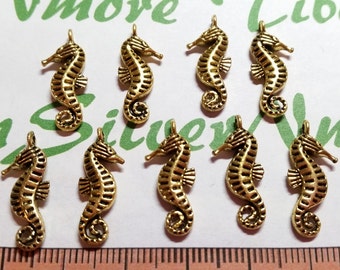 12 pcs per pack 21x9mm reversible Seahorse Charm Antique Gold Lead Free Pewter.