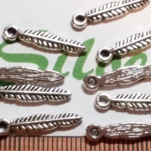 48 pcs per pack 17x3mm Tiny Feather Charm Antique Silver Finish Lead Free Pewter
