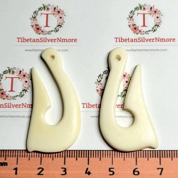 2 pcs of approx. 46x22mm one side Hand-carved Hei Matau White Cow Bone