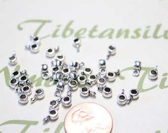 70 piezas por paquete Diámetro del orificio de apertura de 3 mm y 2 mm con bucle de 1,5 mm Tubo liso Acabado en plata antigua Peltre sin plomo