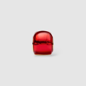 14k gold-plated Iron Man helmet charm with red enamel details and white glow-in-the-dark eyes.