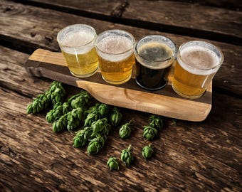 Tabla de degustación de cervezas con vasos