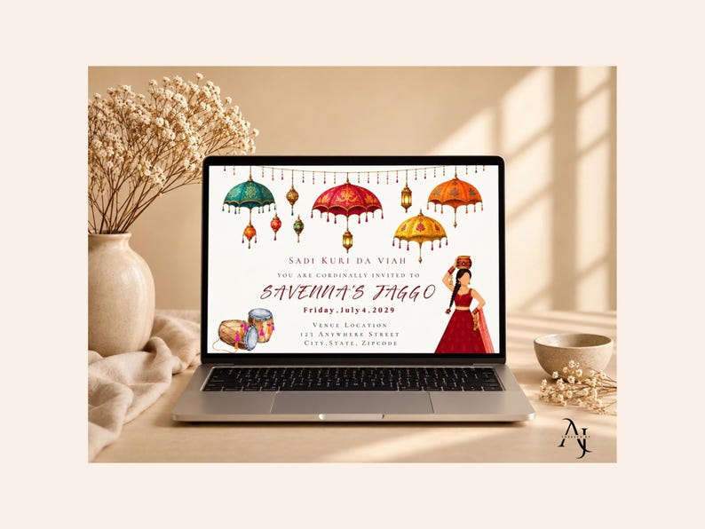 May include: A laptop screen displaying a digital invitation for Savenna's Jaggo on Friday, July 4, 2029. The design features watercolor illustrations of colorful umbrellas, hanging lanterns, two drums, and a person in a red dress carrying a pot.