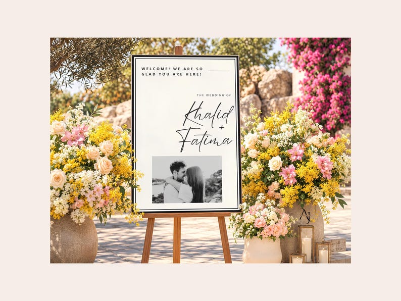 A wedding welcome sign for Khalid and Fatima on a wooden easel, surrounded by large floral arrangements with yellow and pink flowers.