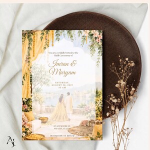 The wedding invitation template placed over a dark brown woven charger plate and a white cloth, accompanied by dried floral stems.