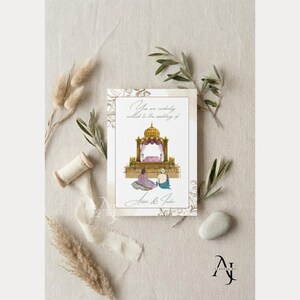 A single wedding invitation card featuring an altar illustration lies on a neutral fabric background surrounded by dried botanical stems and a smooth stone.