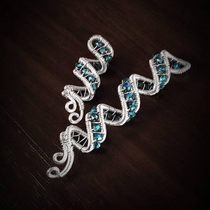 Silver beaded hair wrap with artisan charm, perfect for wedding braids