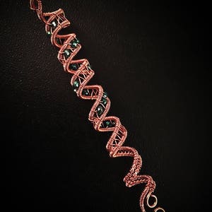 Boho copper hair wrap with a unique bead, perfect for festival