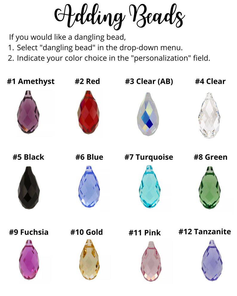 May include: Twelve different colored teardrop-shaped beads, numbered 1 through 12, for adding to jewelry. The beads are amethyst, red, clear, clear (AB), black, blue, turquoise, green, fuchsia, gold, pink, and tanzanite.