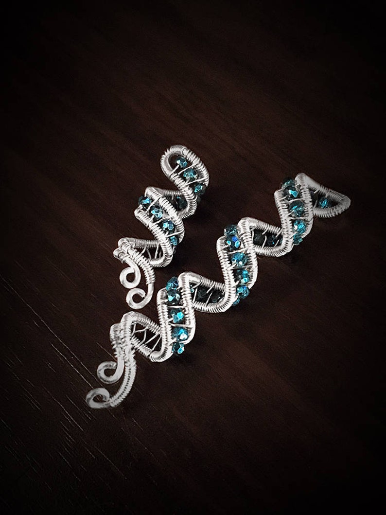 Silver beaded hair wrap with artisan charm, perfect for wedding braids