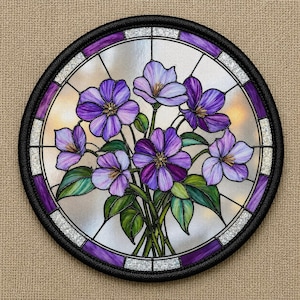 May include: A circular stained glass panel featuring a bouquet of purple flowers with green leaves. The design is encased in a black frame with a border of purple and silver segments. The background consists of clear glass panels with lead lines.
