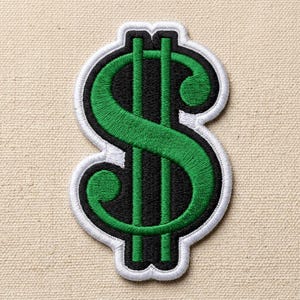 May include: Embroidered patch featuring a green dollar sign ($) on a black background, outlined in white. The patch is a symbol of wealth and financial success, suitable for clothing or accessories.