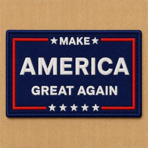 May include: A rectangular patch with a navy blue background and a red border. The words "MAKE AMERICA GREAT AGAIN" are embroidered in white. The patch has stars at the top and bottom.