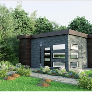 Puede incluir: Un edificio moderno de una sola planta con fachada de piedra gris oscuro y detalles en madera oscura. El edificio tiene ventanas rectangulares y una puerta oscura. El paisajismo incluye un camino de piedra, césped verde y varias plantas y árboles.