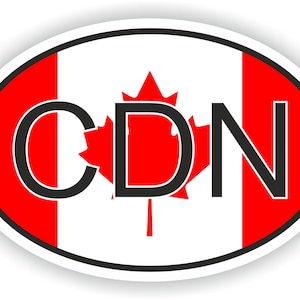 May include: A red, white, and black oval sticker with the Canadian flag and the text "CDN".