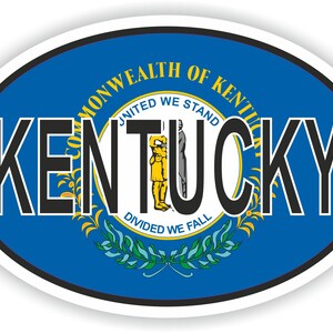 May include: Oval sticker with the state seal of Kentucky. The seal features a blue background with a gold and white image of two men shaking hands. The text "Commonwealth of Kentucky" is written in a circle around the image. The text "United We Stand, Divided We Fall" is written below the image. The word "Kentucky" is written in large black letters across the seal.